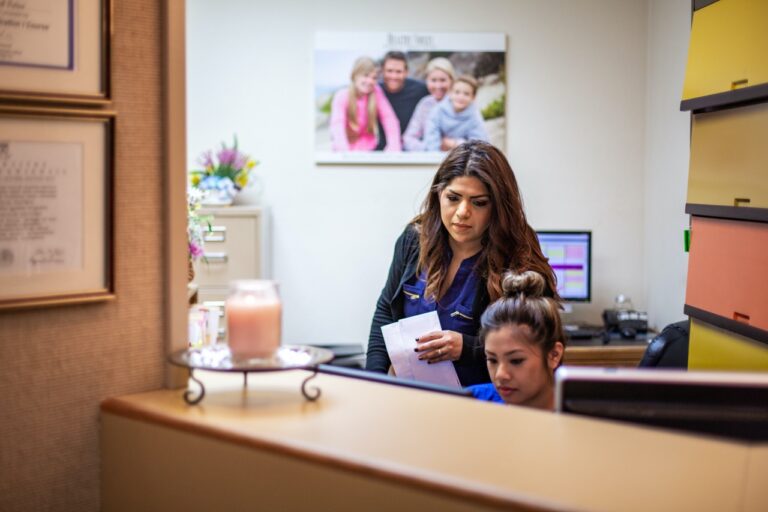 front desk and 2 employees at healthy smiles family dentistry