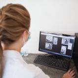 woman reviewing teeth xrays